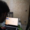 Man looking at computer screen
